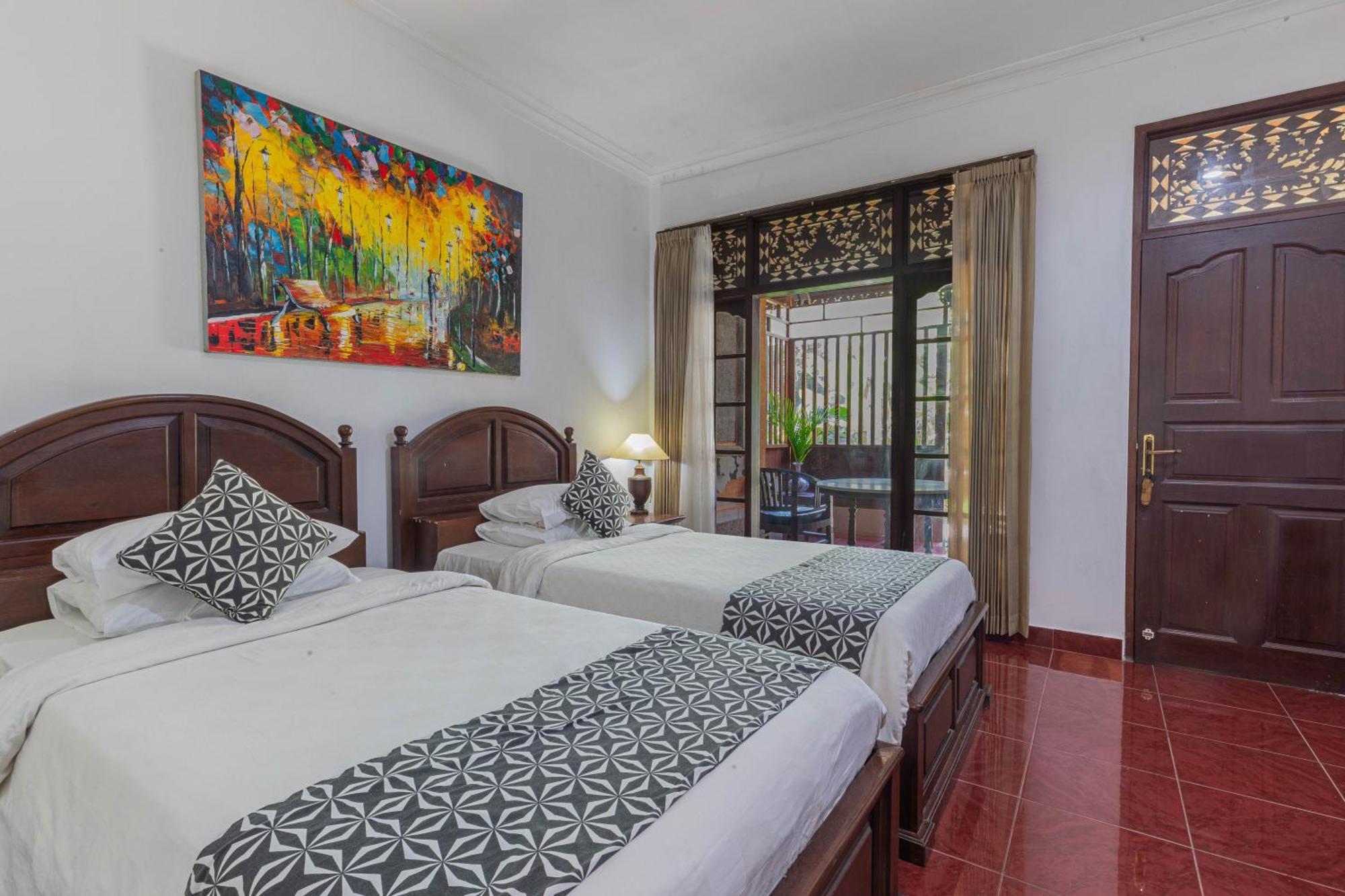 Puri Mango Guest House Sanur Экстерьер фото