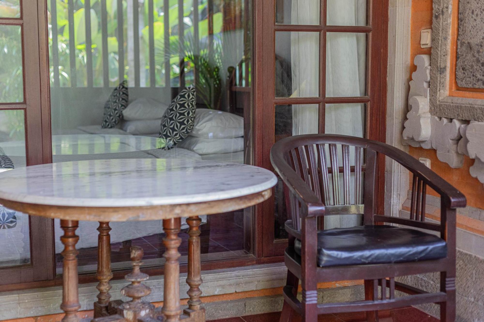 Puri Mango Guest House Sanur Экстерьер фото