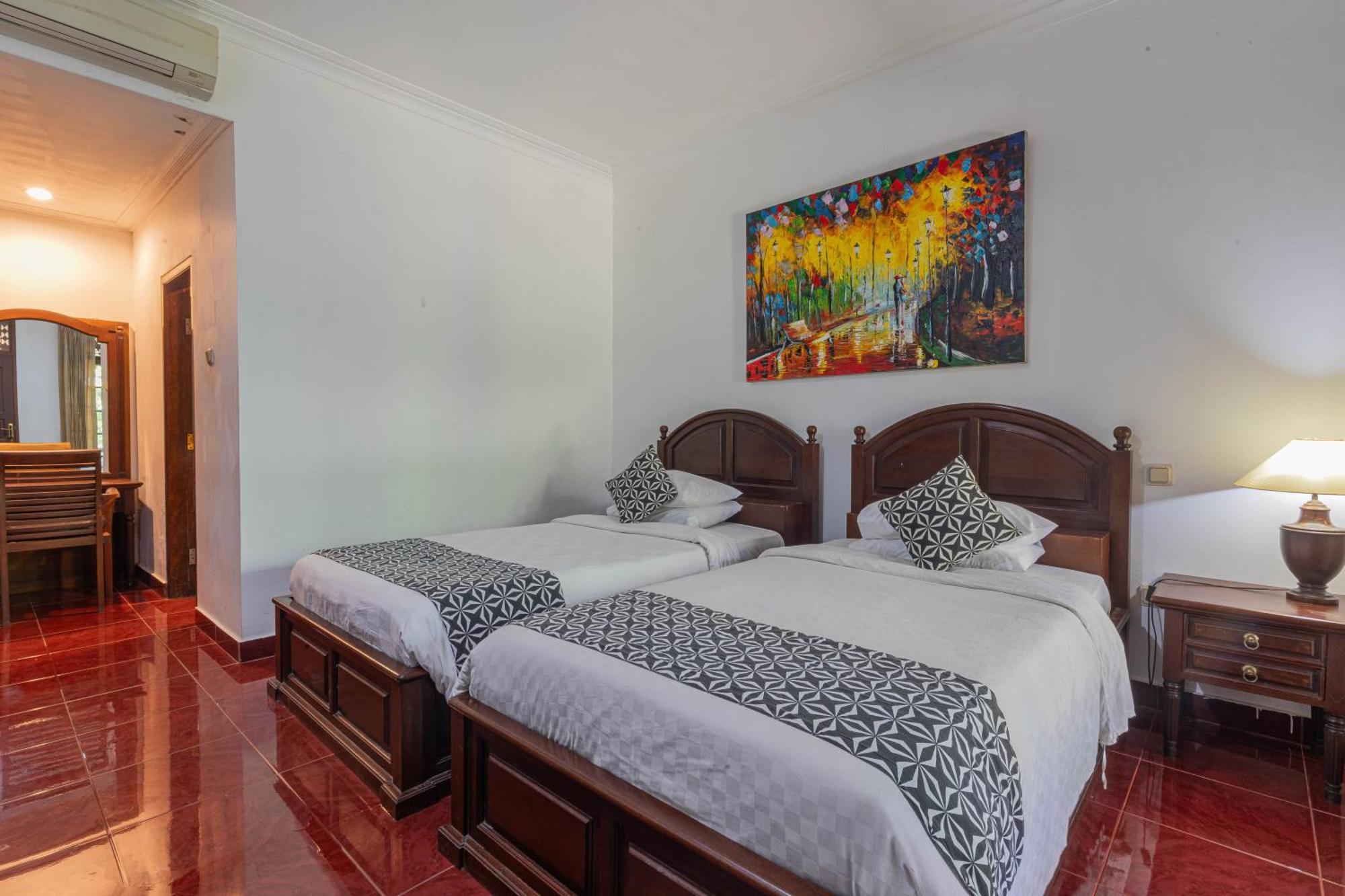 Puri Mango Guest House Sanur Экстерьер фото
