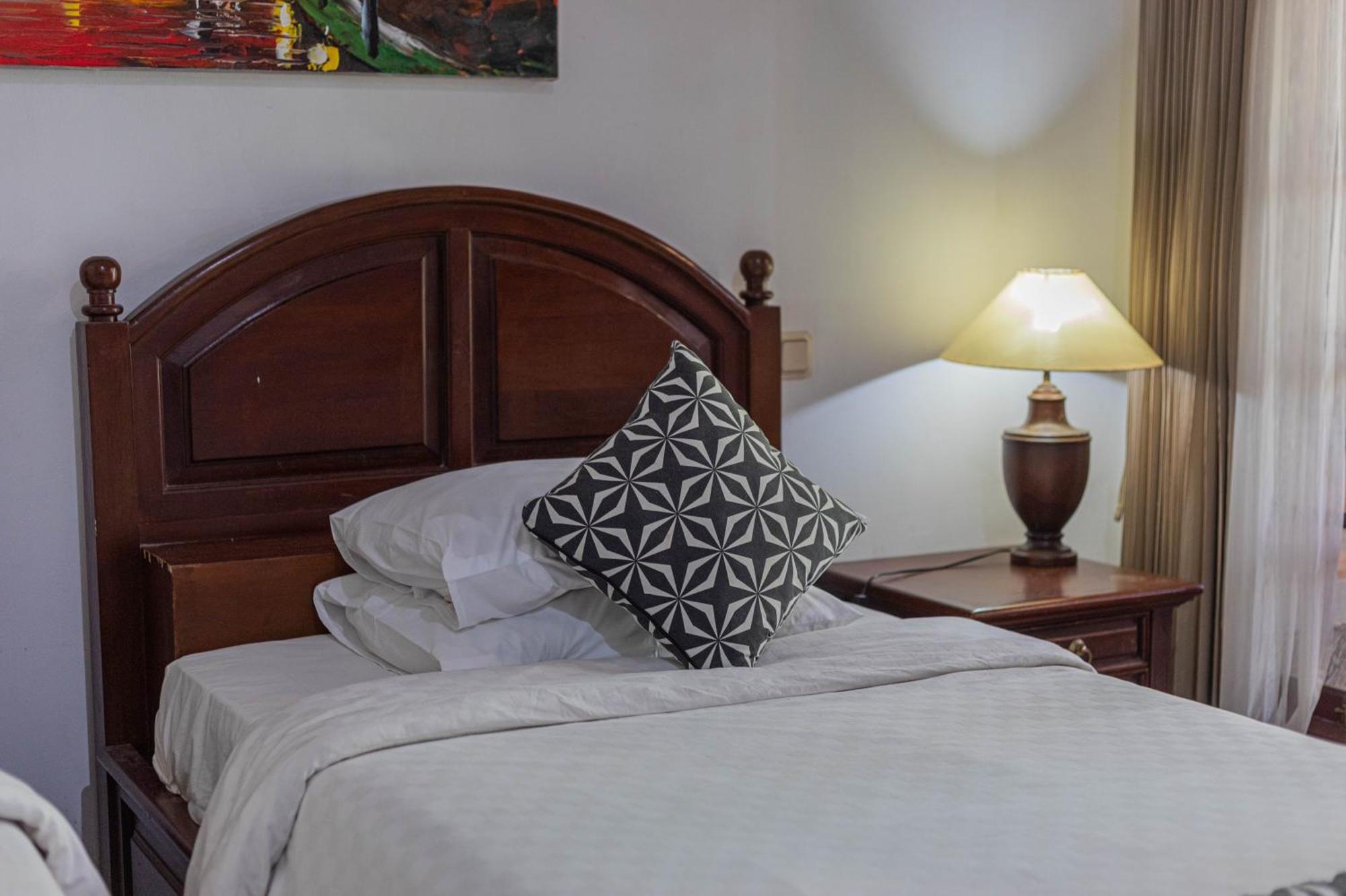 Puri Mango Guest House Sanur Экстерьер фото