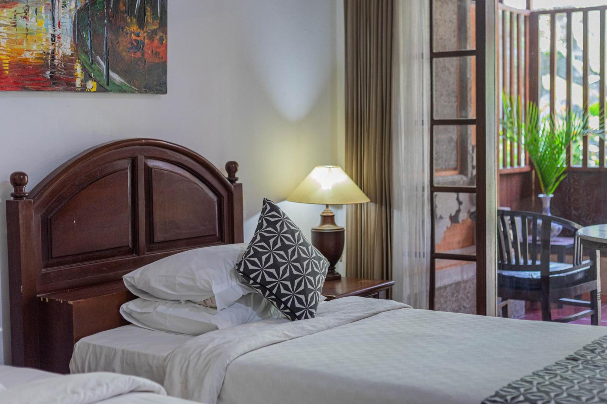 Puri Mango Guest House Sanur Экстерьер фото