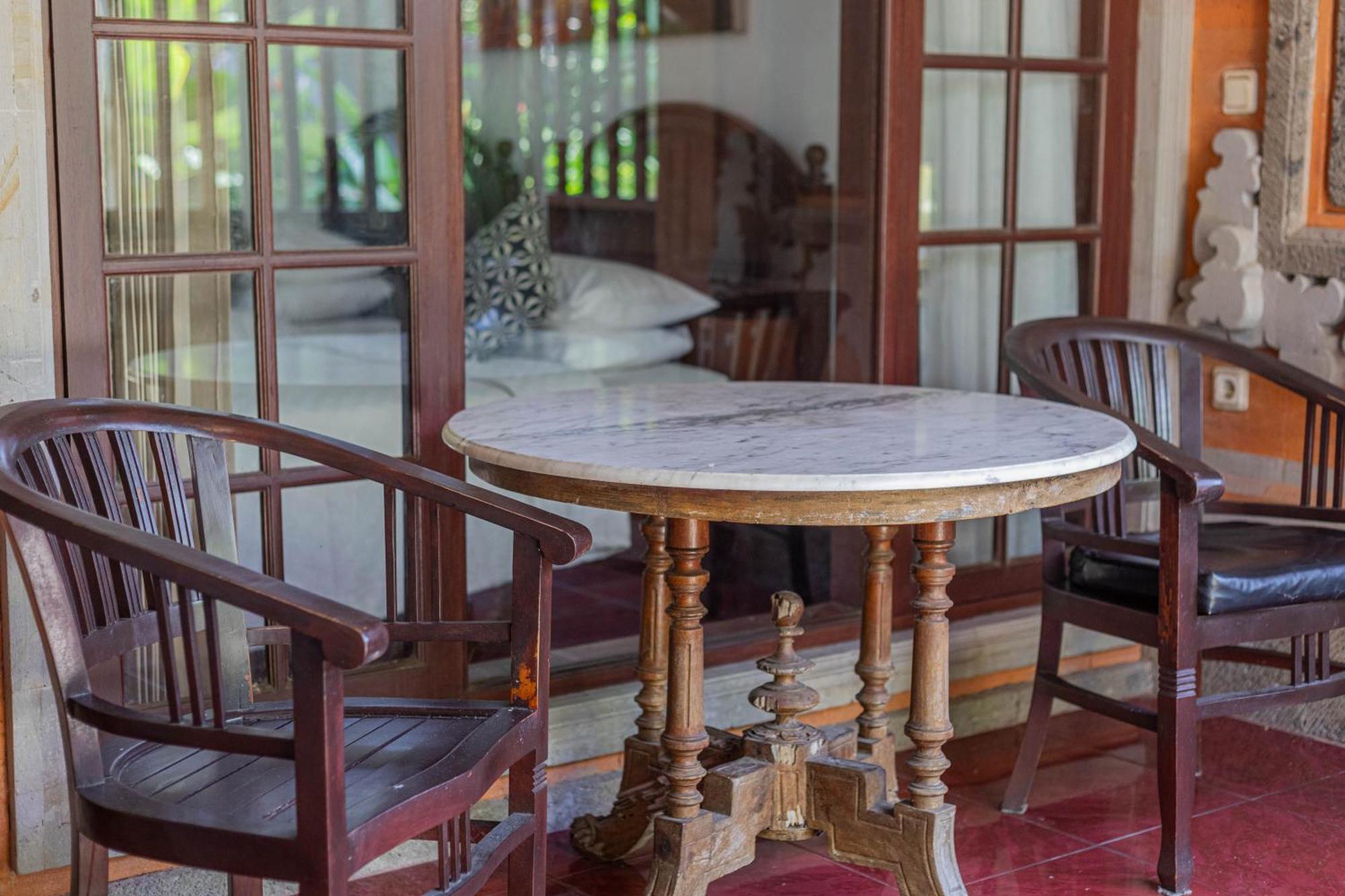 Puri Mango Guest House Sanur Экстерьер фото