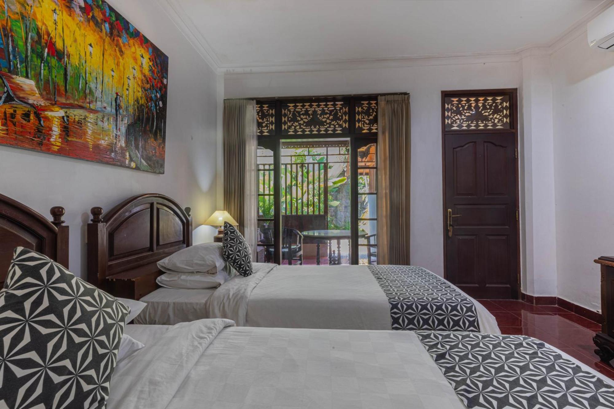 Puri Mango Guest House Sanur Экстерьер фото