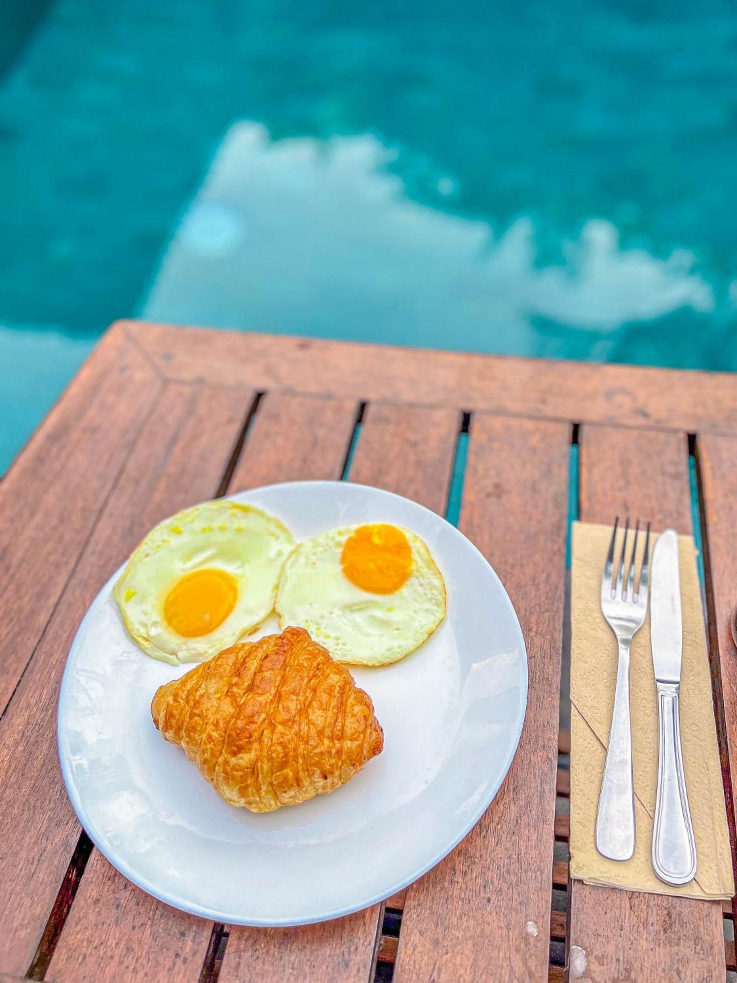 Puri Mango Guest House Sanur Экстерьер фото