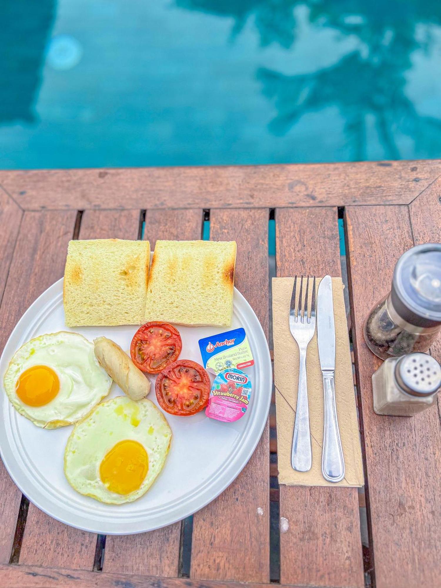 Puri Mango Guest House Sanur Экстерьер фото