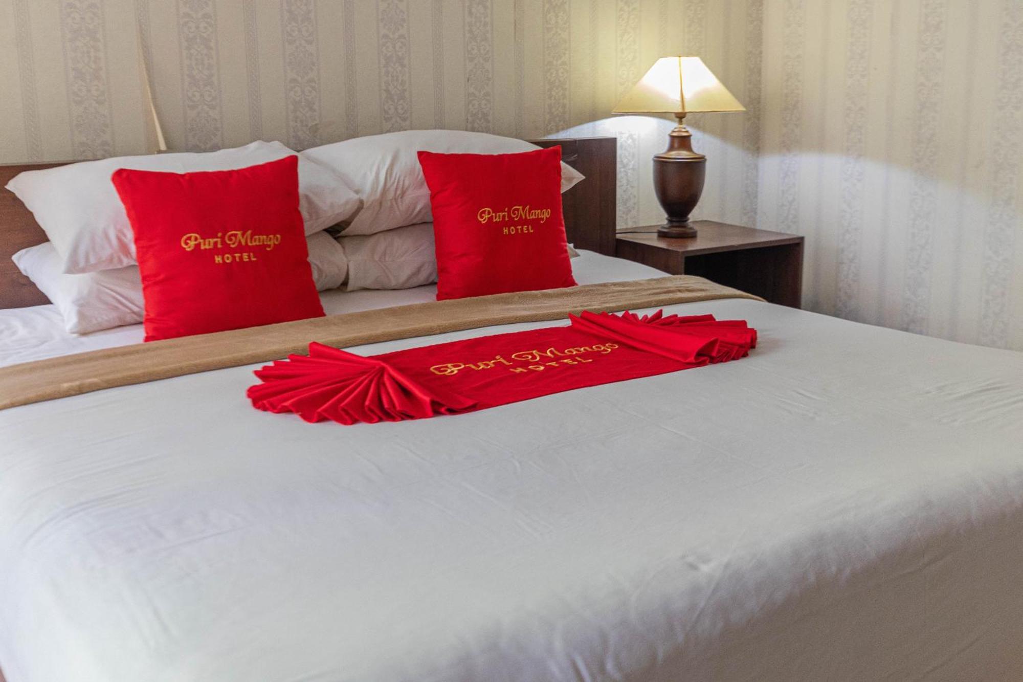 Puri Mango Guest House Sanur Экстерьер фото