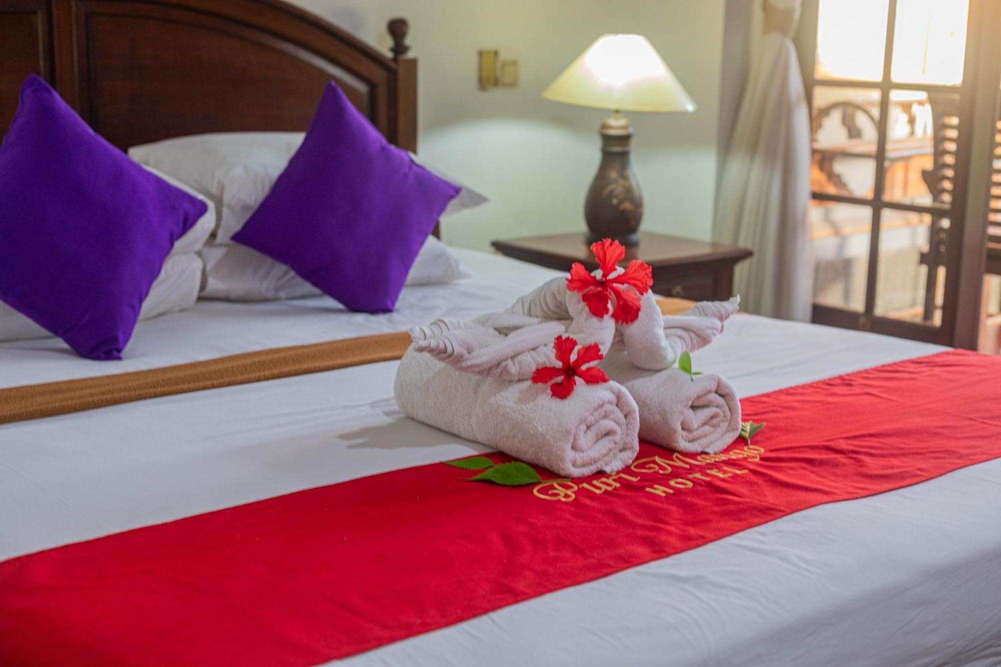 Puri Mango Guest House Sanur Экстерьер фото