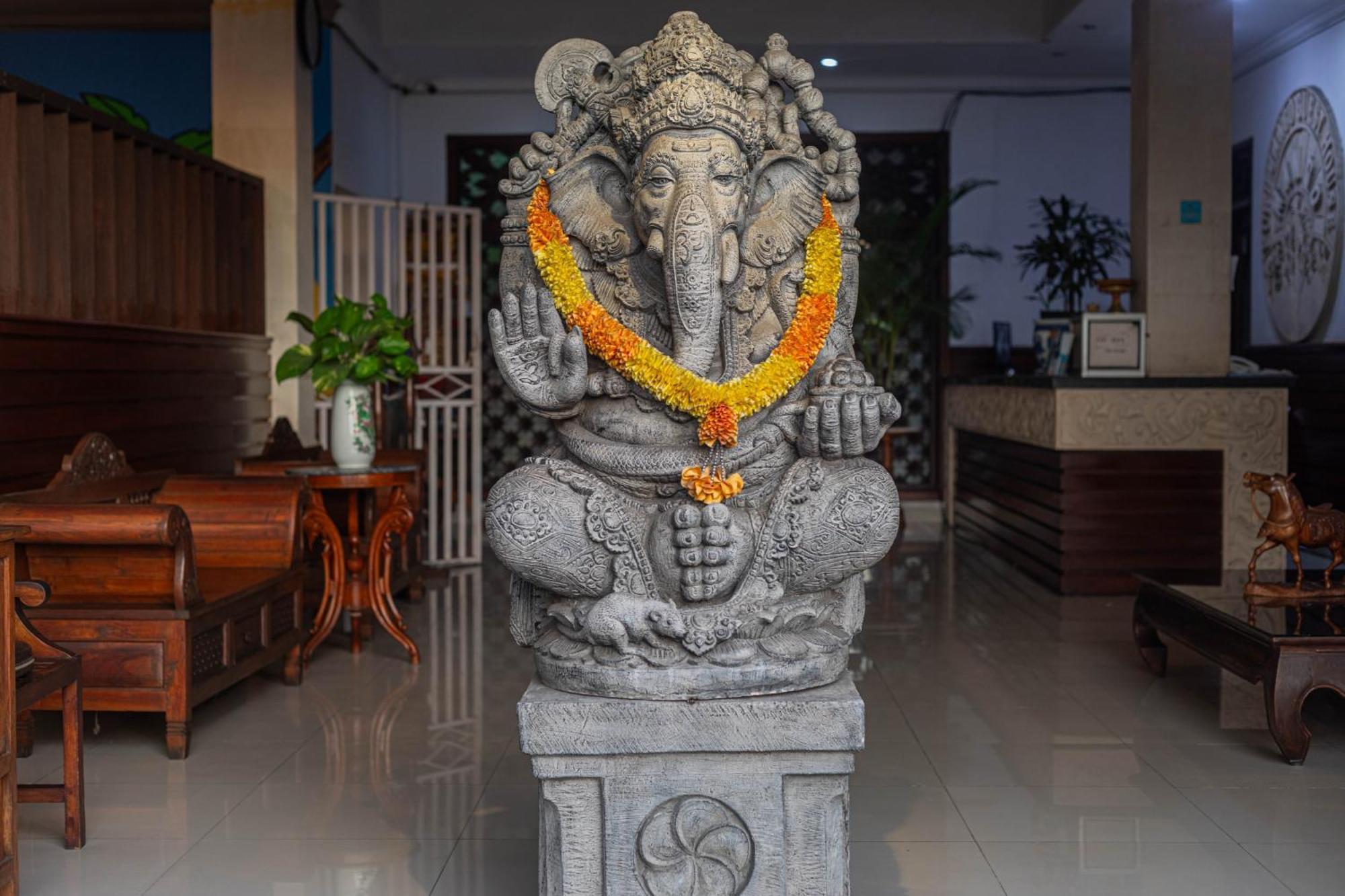 Puri Mango Guest House Sanur Экстерьер фото