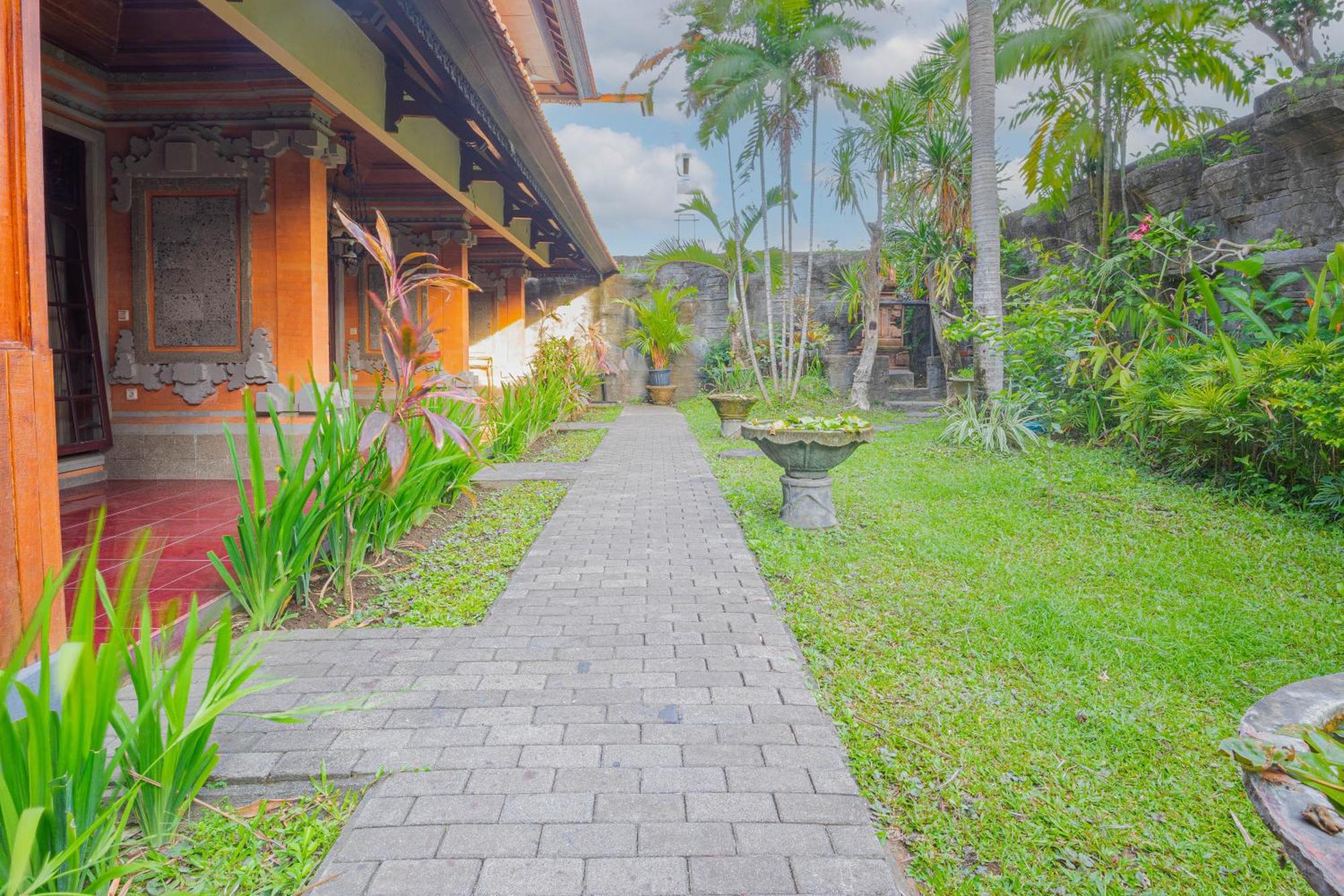 Puri Mango Guest House Sanur Экстерьер фото