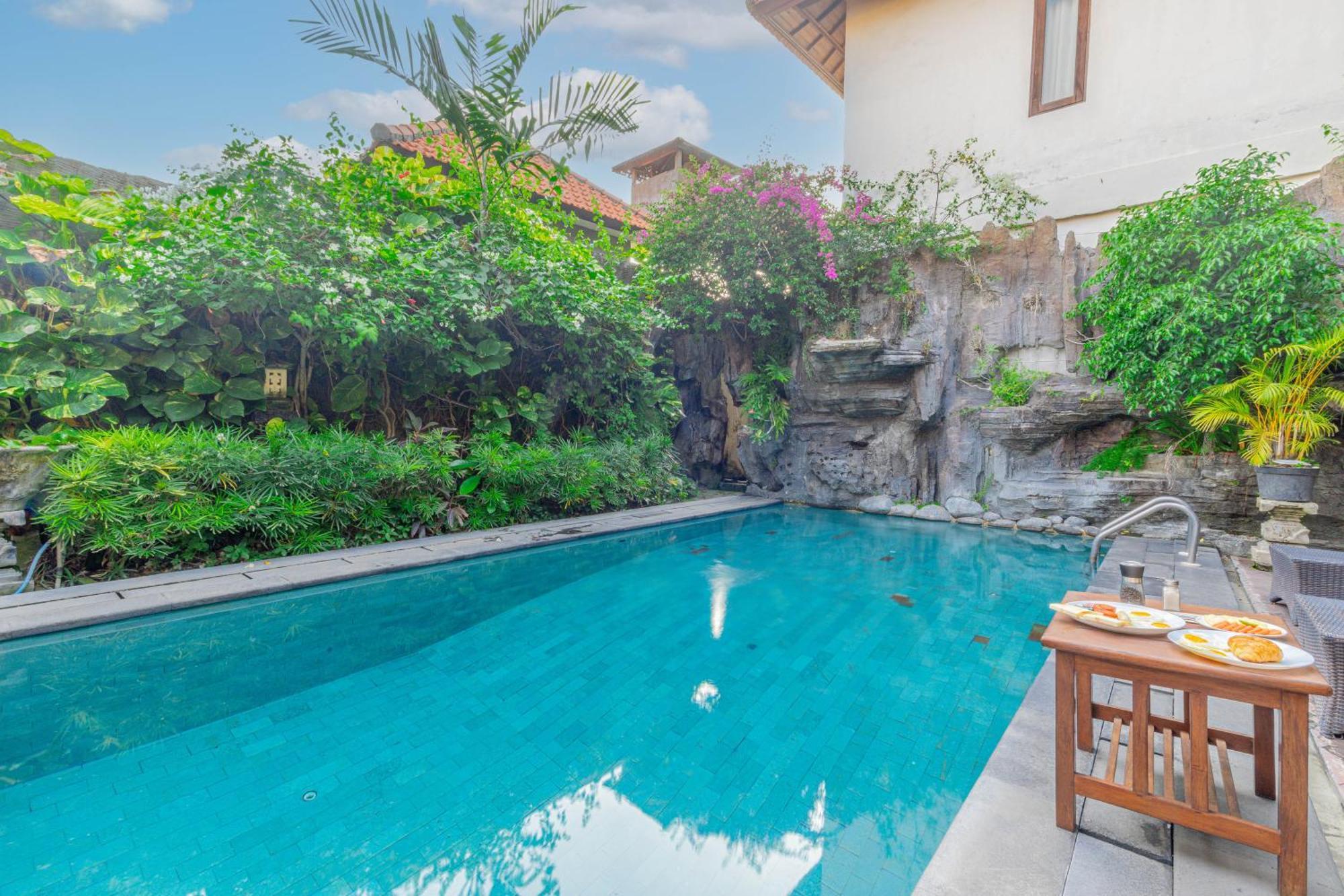 Puri Mango Guest House Sanur Экстерьер фото