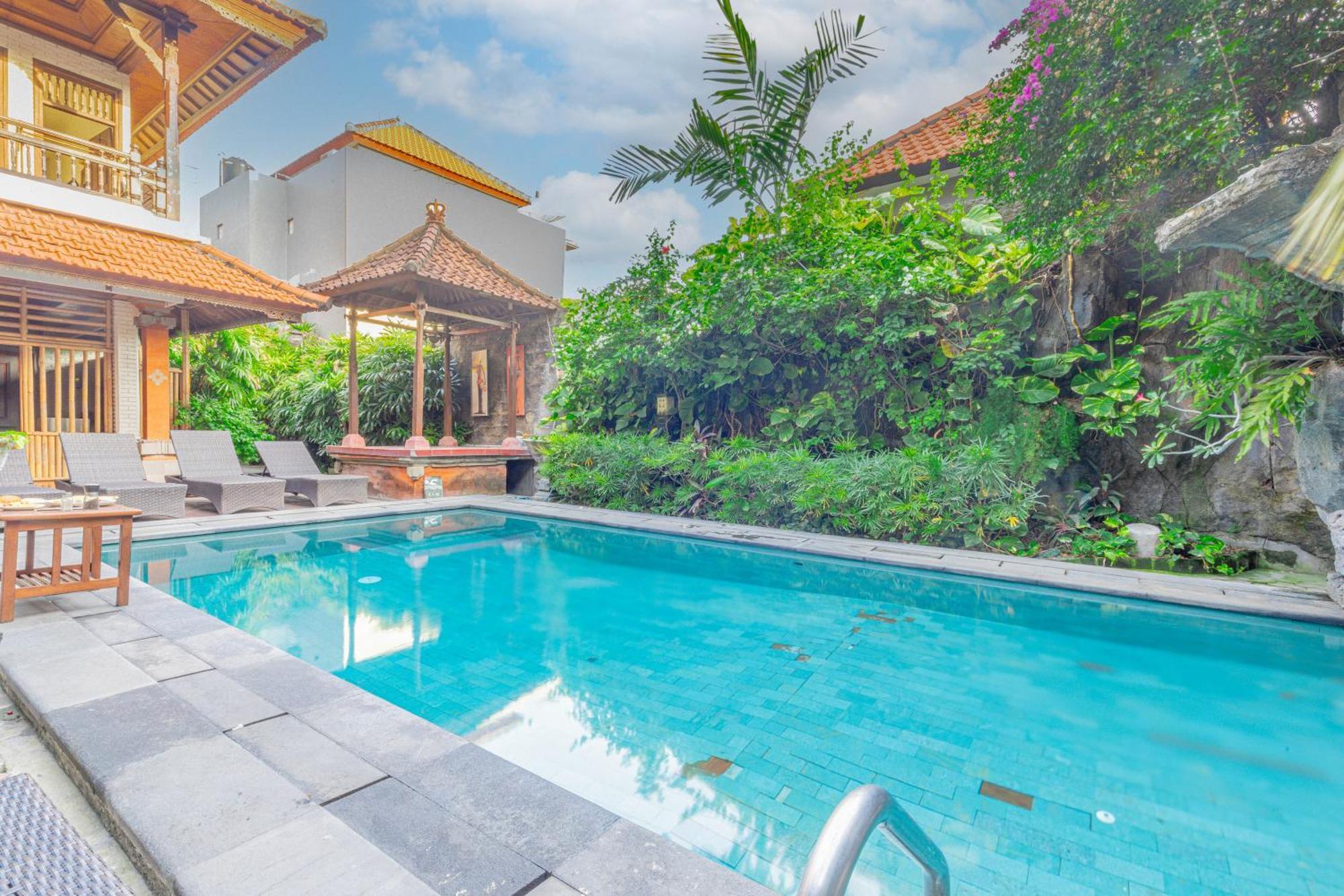 Puri Mango Guest House Sanur Экстерьер фото