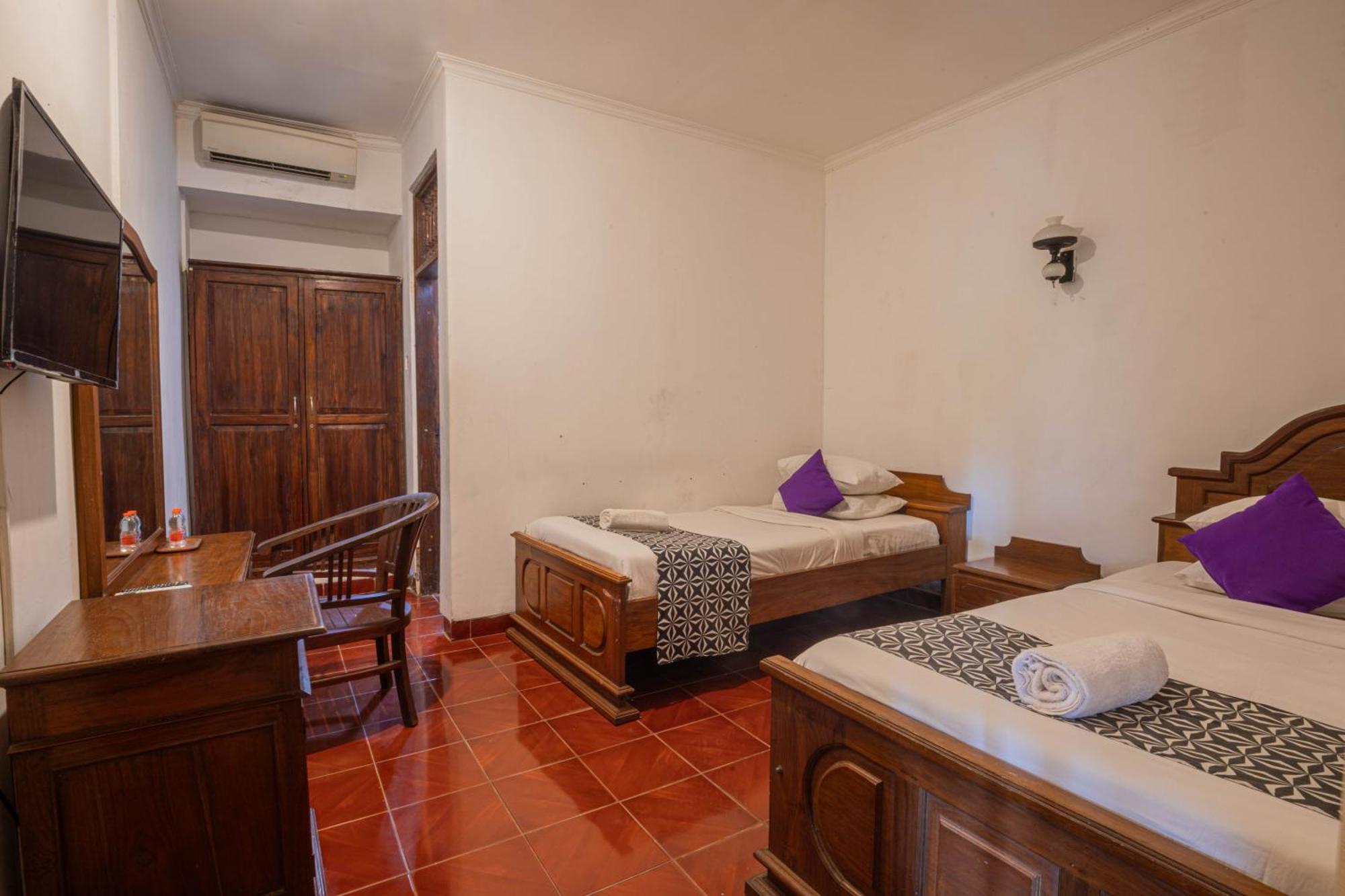 Puri Mango Guest House Sanur Экстерьер фото