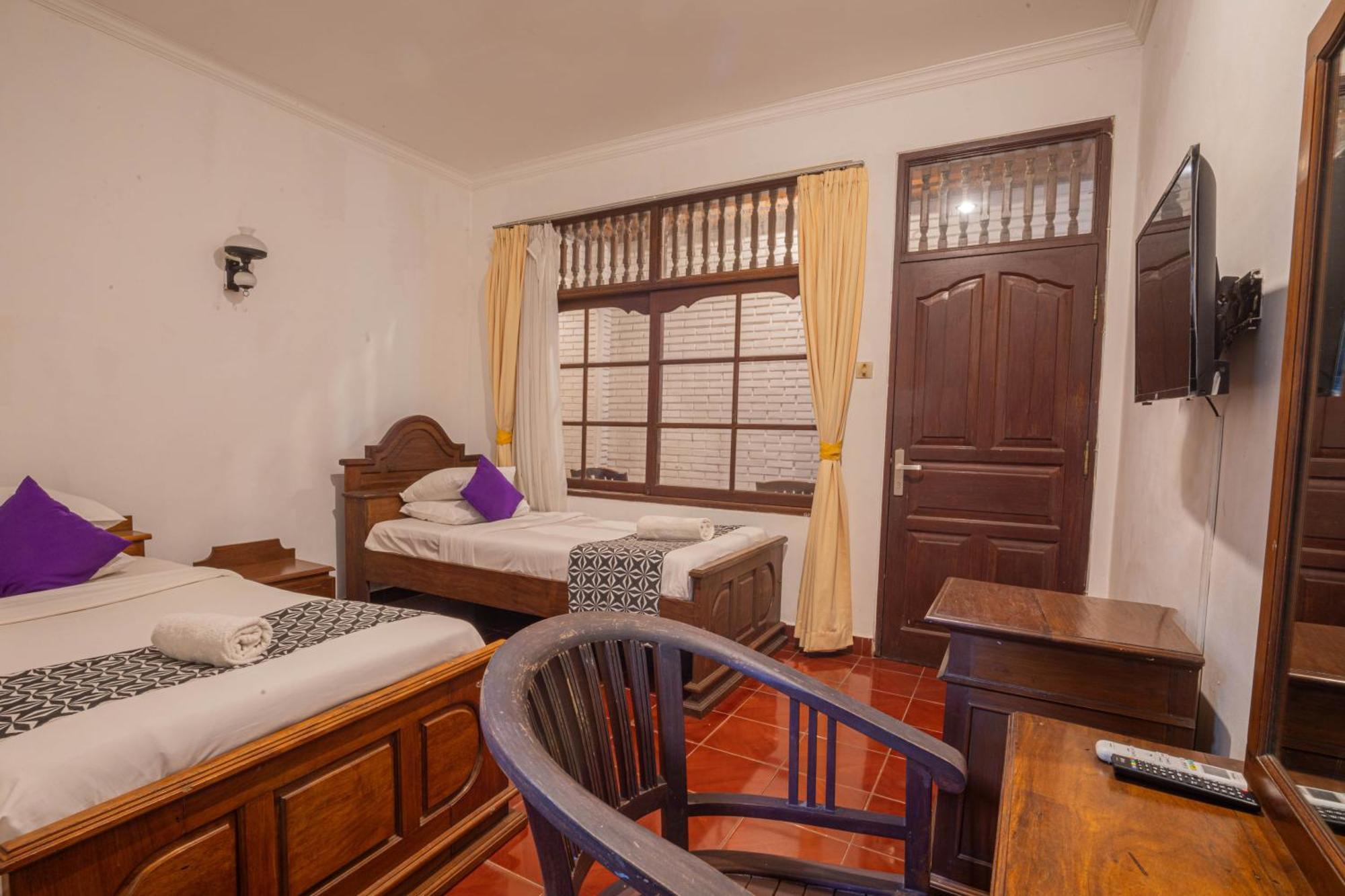 Puri Mango Guest House Sanur Экстерьер фото