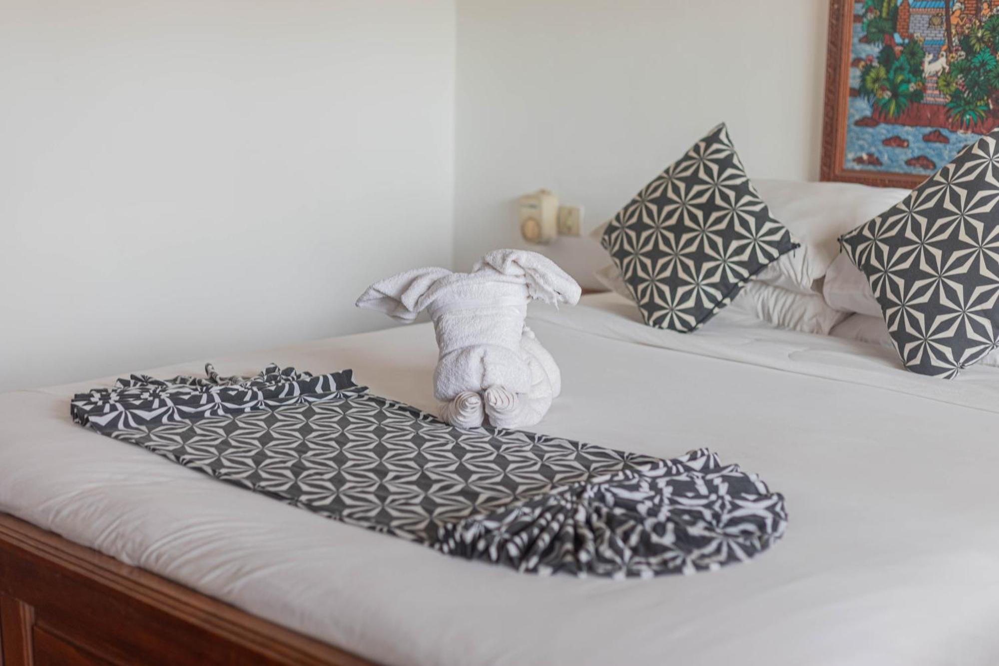 Puri Mango Guest House Sanur Экстерьер фото