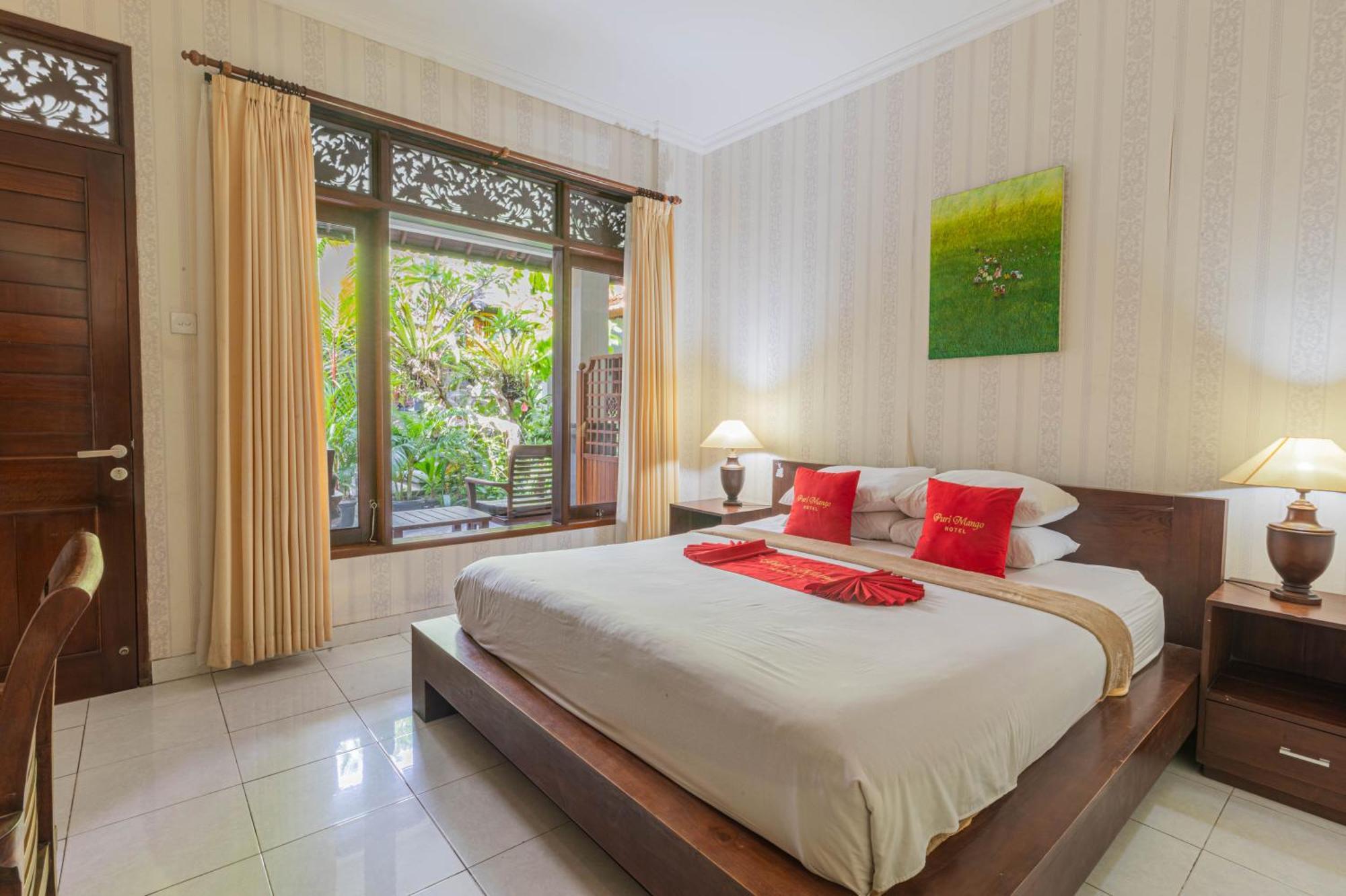 Puri Mango Guest House Sanur Экстерьер фото