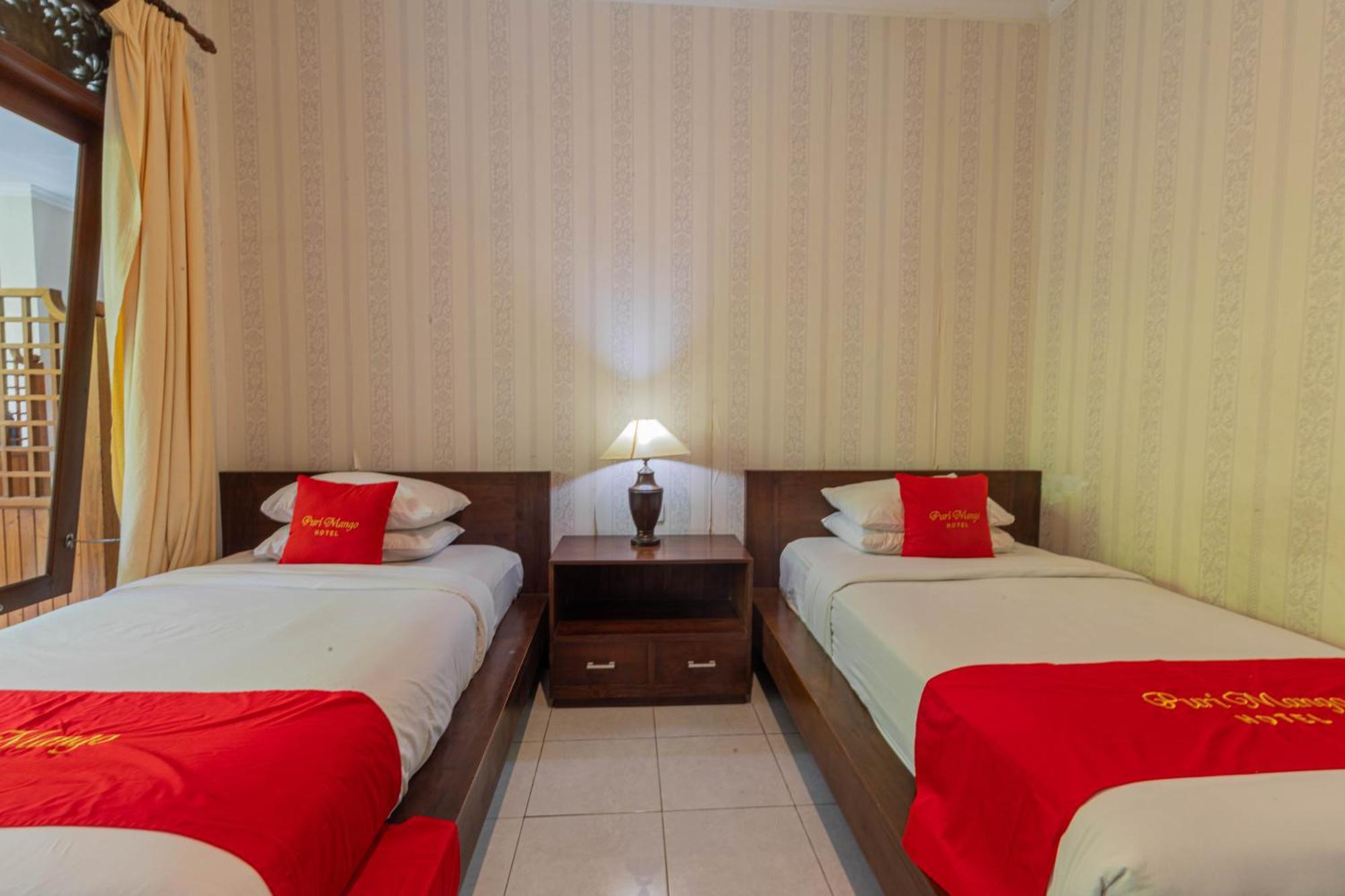 Puri Mango Guest House Sanur Экстерьер фото