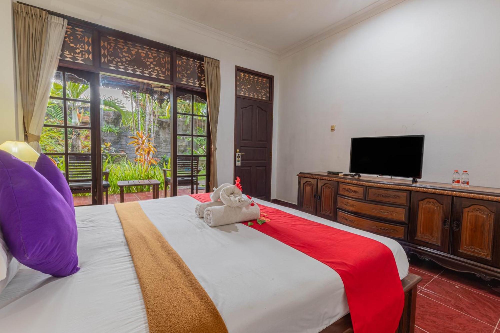 Puri Mango Guest House Sanur Экстерьер фото