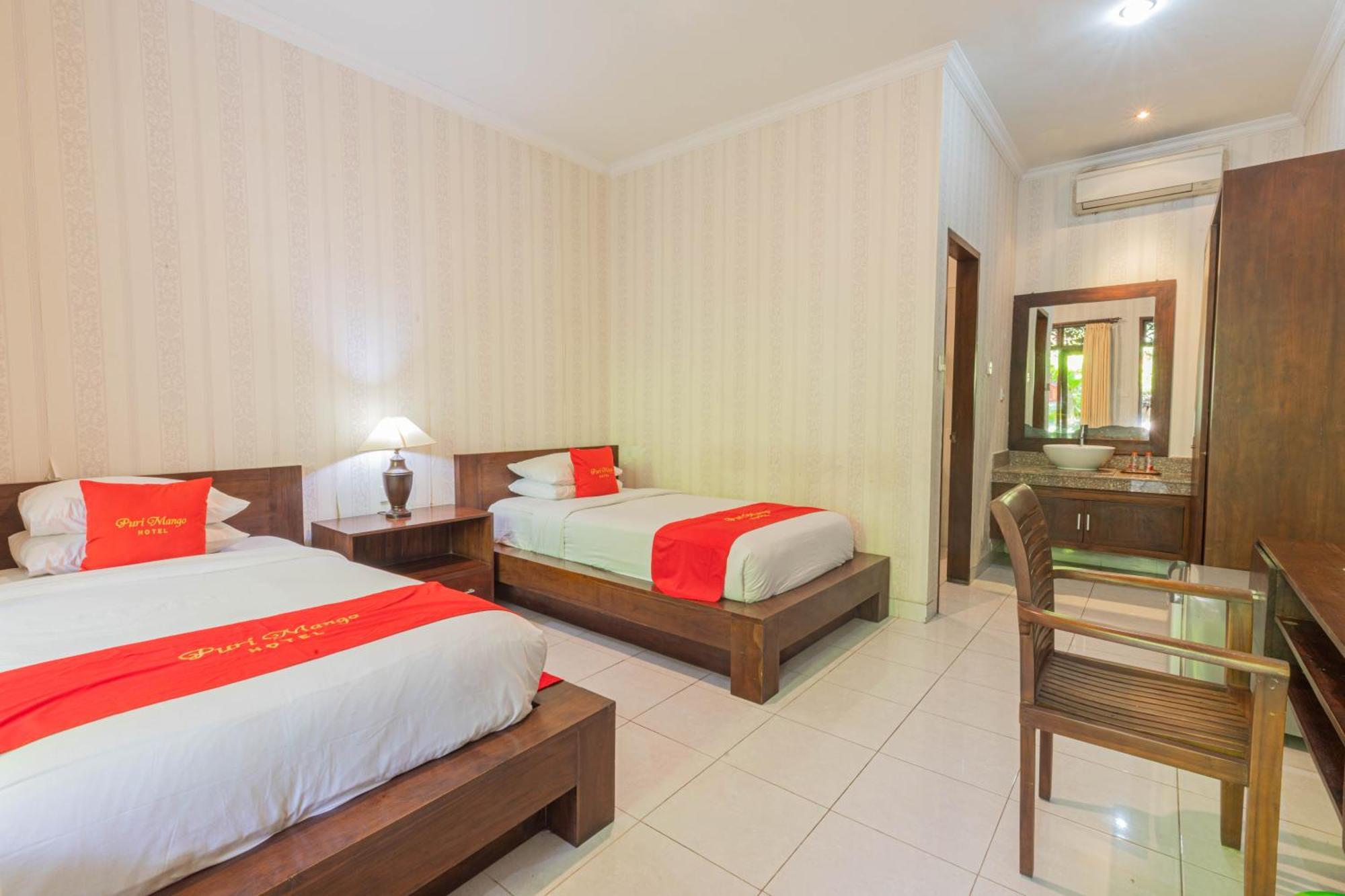 Puri Mango Guest House Sanur Экстерьер фото