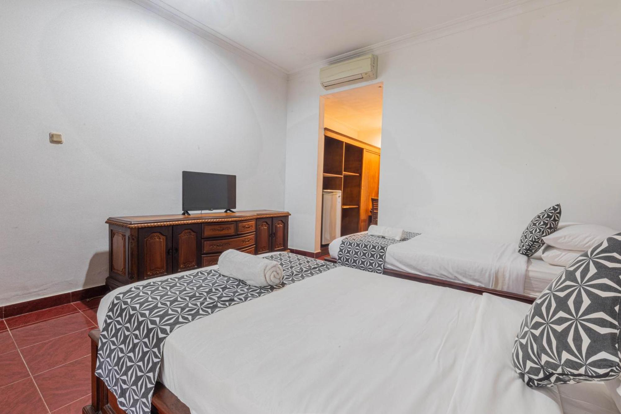 Puri Mango Guest House Sanur Экстерьер фото