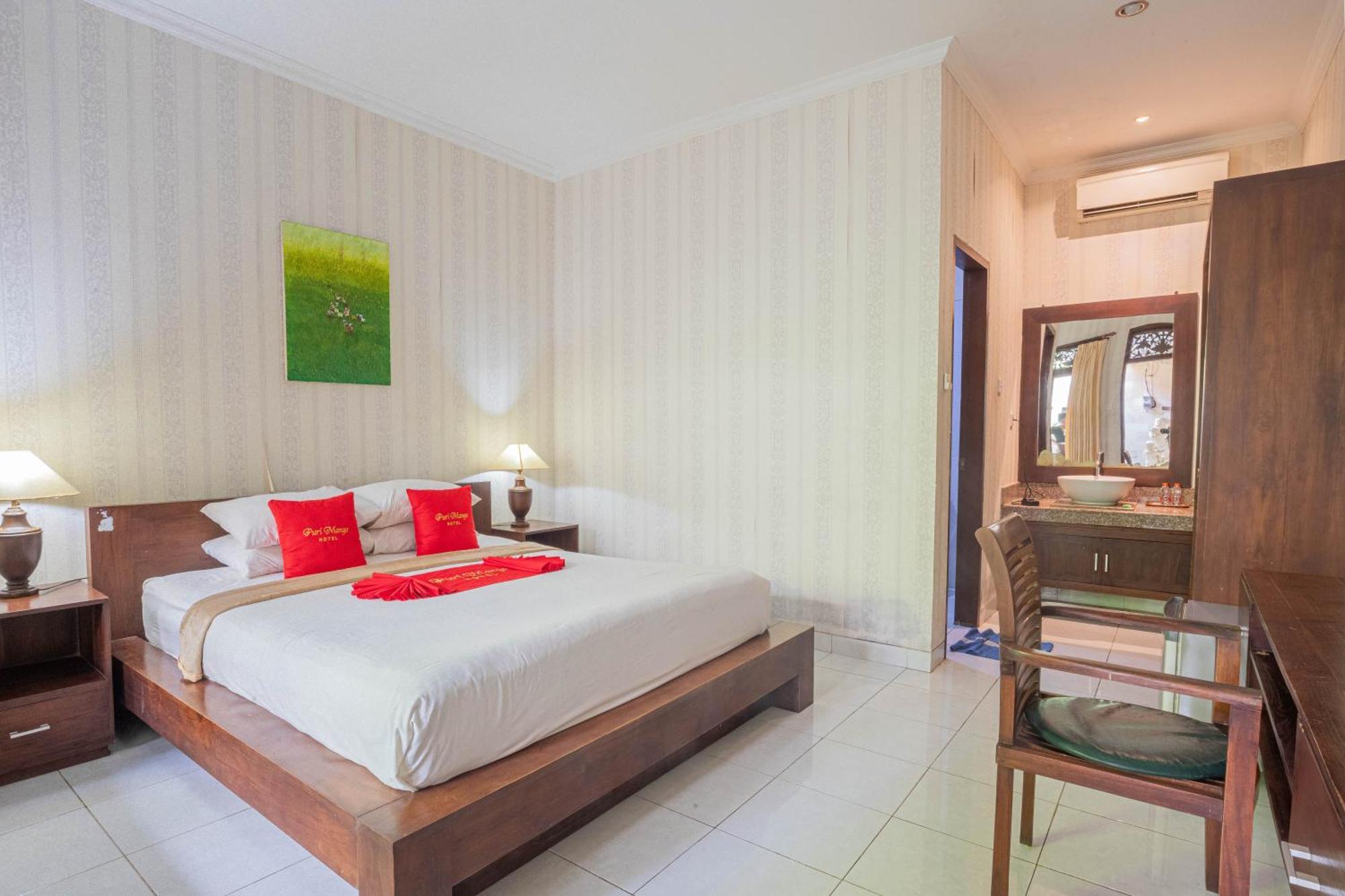 Puri Mango Guest House Sanur Экстерьер фото