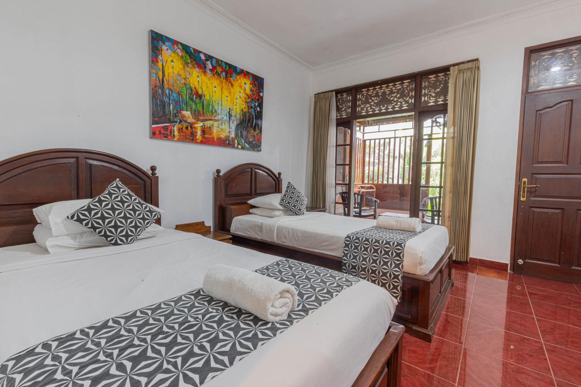 Puri Mango Guest House Sanur Экстерьер фото