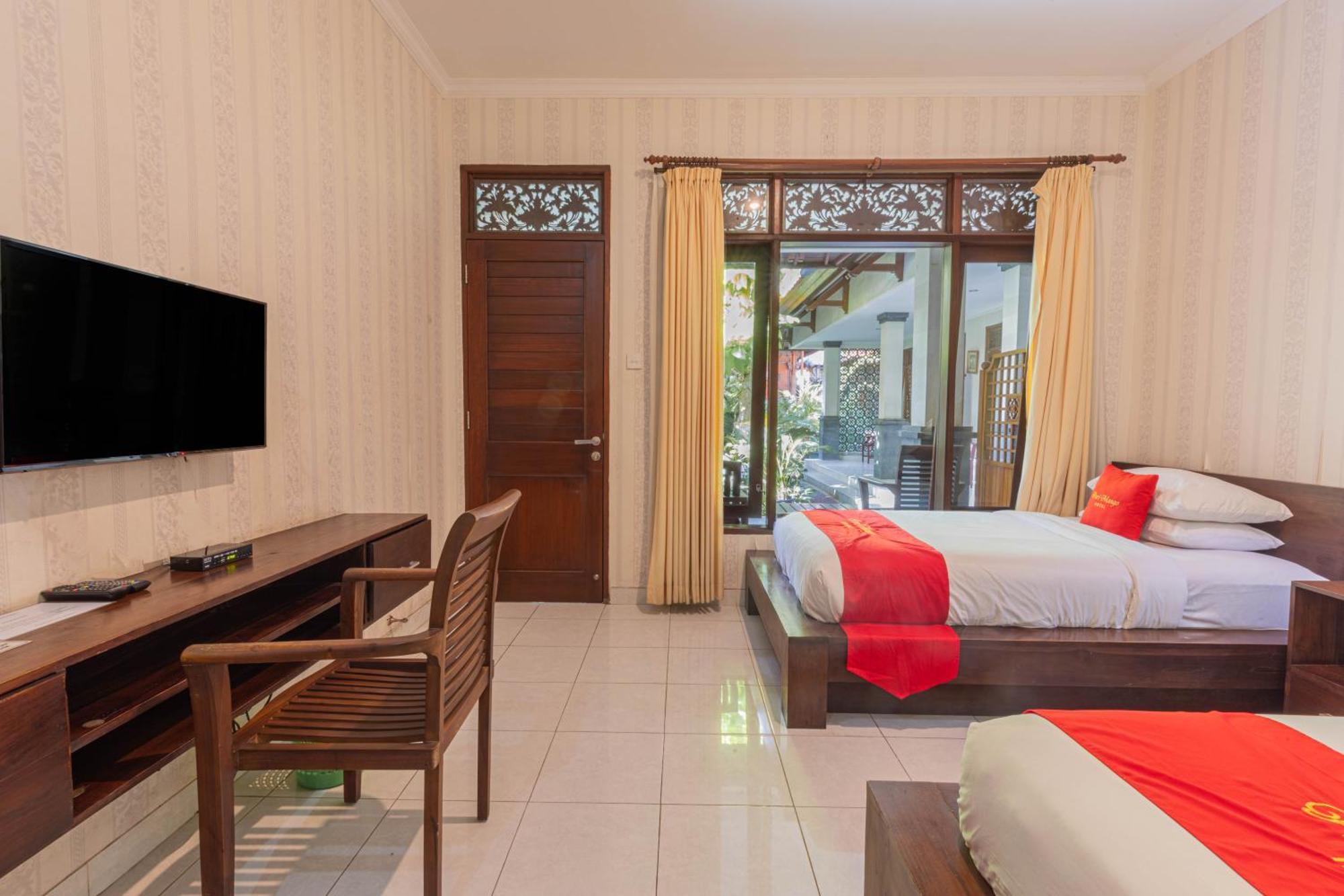 Puri Mango Guest House Sanur Экстерьер фото