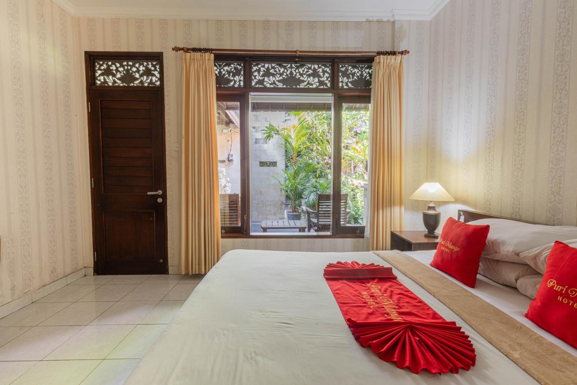 Puri Mango Guest House Sanur Экстерьер фото